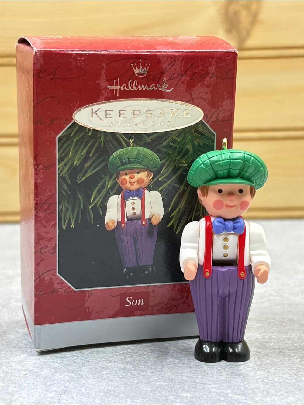 Hallmark Keepsake Ornament Son in Green Hat with Purple Overalls